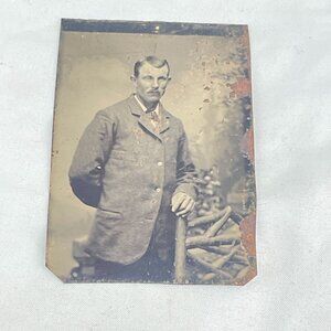 Antique Tintype Photograph Of A Gentleman In Suit Posing By Fence